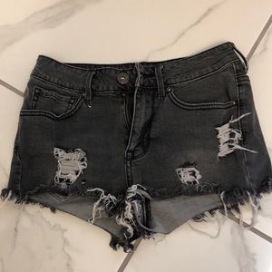 Distressed black denim shorts